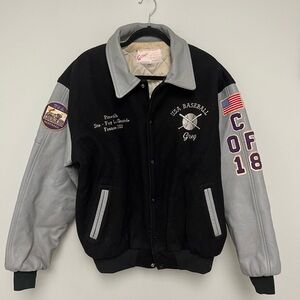 Vintage Gotta Leather Sleeve Letterman Jacket. Size XL.
Grey